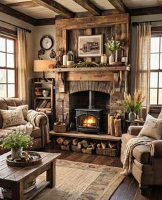 a living room filled with furniture and a fire place in the middle of it's fireplace