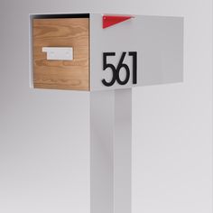 Update your home's curb appeal with our Malone Mailbox—now with a sleek sublimated wood-styled steel door option. This mailbox will accent and give the perfect look to any home. The size of the mailbox is perfect to house small-sized packages. Mounted Mailbox, The Mailbox, Steel Door, Home Improvement Store, Steel Doors, Hardware Store, Mailbox, Curb Appeal, Small House