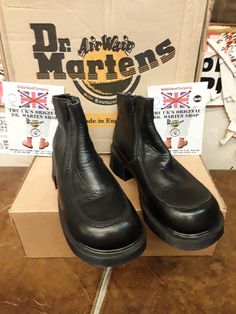 These are a model of Dr MARTENS that were made in the heyday of the 1990s. They were made at their original factory in Northampton,  England.   These boots were only made for a couple of seasons, so were rare even back then.  The boot is finished in black leather and has two zips for ease of use. They are ankle length and have a black so,e unit with a heel. These are a uk size 4 European 37 ladies USA 6 Northampton England, Dr Martens Shoes, Hunter Boots, Beautiful Shoes, Dr. Martens, Boot Shoes Women, New Shoes, Rubber Rain Boots, Perfect Pair