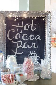 a hot cocoa bar with candy and candies