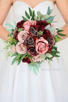 a bridal holding a bouquet of red and pink flowers