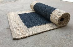 a rolled up rug laying on the ground