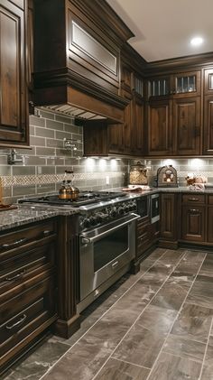 a large kitchen with wooden cabinets and stainless steel stove top oven, dishwasher and microwave