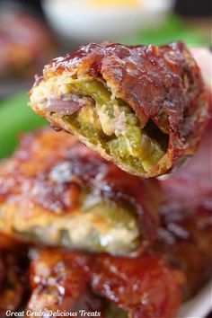 a close up of food on a plate with broccoli and meat in it