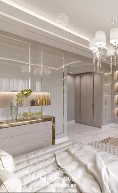 the interior of a bedroom with white furniture and chandelier