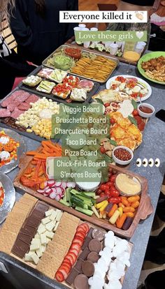 a table filled with lots of different types of food