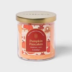 pumpkin pancakes candle in a glass jar with a gold lid and label on the front