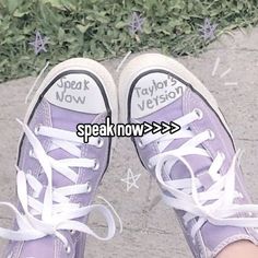 someone is wearing purple converse shoes with white laces on their ankles and the words speak now are written across them