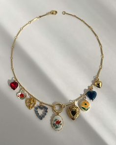 the weekly drop just went live!🐇🌷🦋🕊️ #vintagecharmbracelet #mixedmetaljewelry #springfashion #charmnecklace #uniquejewelry #pinterestinspired #trendingstyle #2024trends #shabbychic Trendy Gold Plated Charm Choker Necklace, Trending Jewelry 2024, Trendy Multicolor Heart Charm Necklace, Trendy Metal Charm Choker Necklace, Jewelry Trends 2024, Whimsical Gold Charm Necklaces, Funky Charm Necklace, Dopamine Jewelry, Trend Necklace