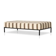 a striped bench with black legs on a white background and brown stripes in the back