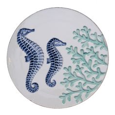 Ceramic plate has a navy seahorse and coral designs. Measures 7.375 x 7.375 x 0.25. Dishwasher safe. 89-3589 Ceramic Seahorse, Ocean Kitchen, Mermaid Tails For Kids, Ceramic Trivet, Coastal Beach House, Beach House Kitchens, Teal Coral, Coral Design, Coastal Life