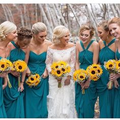 the bride and her bridesmaids are all wearing sunflower bouquets