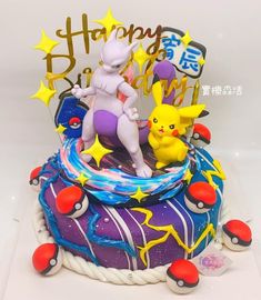 a birthday cake with pokemon characters on it