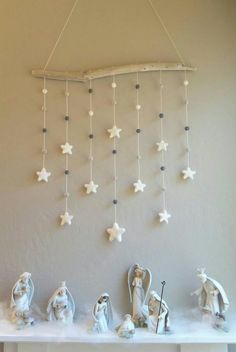 a nativity scene is hanging on the wall