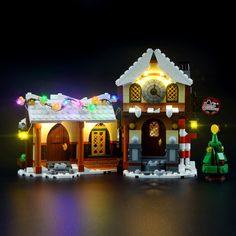 a lego lit up house with christmas lights