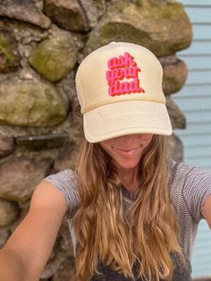 Introducing the "Go Ask Your Dad Trucker Hat" - a trendy and playful addition to our Mama Trucker Hat Collection. This beige unisex sized trucker hat is designed with the modern mom in mind, blending style, comfort, and a touch of humor. Adorned with bold pink text that playfully reads "Go Ask Your Dad," it's the perfect way to add a bit of fun to your daily wear or make a statement at your next gathering. Crafted for women who appreciate a blend of fashion and functionality, this trendy trucker Funny Adjustable Snapback Hat, Beige Cap With Letter Print, Beige Letter Print Cap, Funny White Snapback Hat, Beige Snapback Hat With Letter Print, Cream Snapback Hat One Size, Cute Cream Hat For Gift, Playful Trucker Hat With Curved Brim, Playful Letter Print Hats For Spring