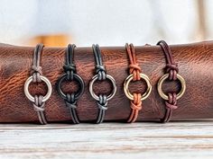 Stacking Boho Leather Bracelet | Create Your Perfect Bracelet! | Handmade To Order A S E N A T H ∙ D E S I G N S ・H A N D M A D E  W I T H  L O V E  This fun and easy to wear adjustable cord bracelet is the perfect accessory. I start with 2mm  genuine leather cord and a petite 3/4" ring. I use a unique double twisted knot to attach the cord to the ring and add an adjustable knot to the back. I love to wear this bracelet by itself for a simple, classic look or stack it with one of my cuff or cord Simple Leather Bracelet Diy, Bracelet En Cuir Diy, Leather Pearl Bracelet, Faux Suede Bracelets, Simple Leather Bracelet, Leather Bracelet Tutorial, Leather Cord Jewelry, Bracelet Photo, Karma Bracelet