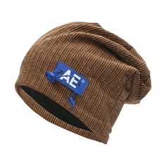 a brown beanie hat with an ae patch on the front and blue logo on the side