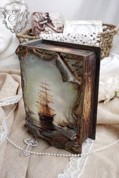 an altered book with a ship on it