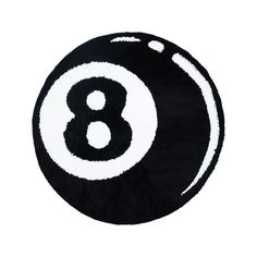 a black and white eight ball rug with the number 8 in it's center