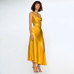 Gold Satin Midi Dress : Sleeve Style: Spaghetti Strap Fabric Type: POLYESTER Neckline: asymmetrical Dresses Length: Mid-Calf Closure Type: zipper Type: Camisole Material Composition: synthetic fiber Gender: WOMEN size: XS,S,M,L Gold V-neck Midi Dress For Evening, Gold V-neck Slip Dress For Spring, Chic Gold Slip Dress For Evening, Gold Satin Cocktail Dress, Elegant Gold V-neck Slip Dress, Gold V-neck Satin Dress, Gold Fitted Silk Slip Dress, Elegant Gold Midi Dress With Spaghetti Straps, Gold Satin V-neck Slip Dress