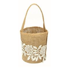 a small basket with white flowers on the handle and handles is shown in front of a white background