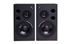 two black speakers sitting next to each other