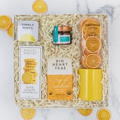 a gift box full of thoughtful and comforting items to aid in get well or thinking of you. tea, cookies, mug, honey, mints and dehydrated oranges. Healthy Box Gift, Sunshine Box Ideas, Box Of Sunshine Gift, Sunshine In A Box, Gift Unboxing, Client Gift Box, Sunshine Box, Rustic Bakery, Company Ideas