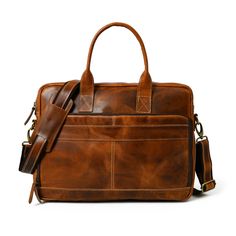 Elevate your professional presence with our Bison Elite Briefcase, meticulously crafted for a stylish edge. Fashioned from the finest full-grain buffalo leather, this masterpiece offers exceptional durability and a unique texture. Designed with capacious compartments and organizational elements, it seamlessly combines practicality with opulence. Its rich brown tone, complemented by striking orange accents, exudes undeniable sophistication, making it a perfect addition to any ensemble. Embrace th Leather Case With Smooth Grain For Everyday Use, Leather Cases With Smooth Grain For Everyday Use, Leather Cases For Everyday Use, Leather Satchel Case For Daily Use, Business Cognac Textured Leather Satchel, Professional Leather Satchel For Everyday Use, Classic Leather Laptop Bag With Smooth Grain, Cognac Textured Leather Satchel For Business, Classic Leather Laptop Case