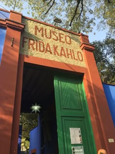 an entrance to the museum fridakaho is painted red, green and blue