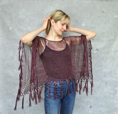 Burgundy hand-knit linen poncho with fringe, Knitted summer cape in boho style, Loose knit beach cover-up A hand-knit linen poncho with fringe is the perfect summer accessory.  This loose-knit poncho is very functional, it could be worn with jeans, a summer dress, or a bikini.  This beautiful garment is excellent over a light dress. It's the perfect cover-up for the summer beach wedding. Poncho is made of linen  One size - S/M/L Color: burgundy (linen yarn), black (linen yarn), navy blue  (linen One Size Tasseled Shawl For The Beach, Beach Shawl With Tassels One Size, Beach Shawl With Tassels, Bohemian Summer Open Knit Poncho, Bohemian Open Knit Poncho For Summer, Bohemian Open Knit Poncho For Beach, Bohemian Open Knit Beach Poncho, Summer Bohemian Open Knit Poncho, One Size Poncho With Tassels For The Beach