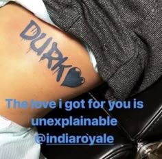 a person with a tattoo on their arm that says, the love i got for you is unexplanable @ indy