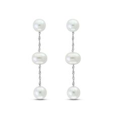 Lustrous freshwater cultured pearls dangle elegantly in these luxurious women's drop earrings. Fashioned in 14K white gold, the earrings secure in place with friction backs. From the Lali Jewels Collection. White Gold Akoya Pearl Dangle Earrings, Classic White Gold Earrings With Pearl Chain, Timeless White Pearl Drop Earrings, White Gold Dangle Pearl Earrings With Pearl Chain, White Gold Dangle Pearl Chain Earrings, Classic White Gold Pearl Chain Earrings, White Pearl Chain Linear Earrings For Formal Occasions, White Pearl Linear Earrings For Formal Occasions, Formal White Linear Earrings With Pearl Chain