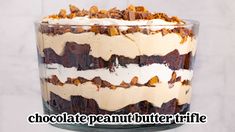 a chocolate peanut butter trifle in a glass bowl with the words, chocolate peanut butter trifle