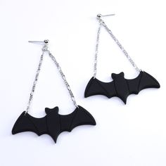 Add these fun bat earrings to your wardrobe this spooky season! Details: Material: Gold Plated Ball Post Length: 3.25" Bat Earrings Diy, Bat Jewelry Diy, Bat Necklace Aesthetic, Black Bat Jewelry, Victorian Bat Jewelry, Everyday Earrings Studs, Bat Earrings, Eyeglass Chain, Accessories Necklace