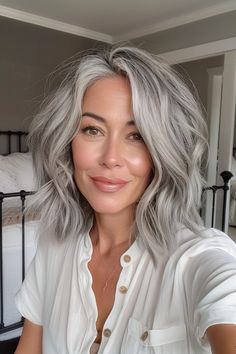 Are you tired of the same old hair color and style? Are you looking for a chic, modern look that stands out from the crowd? Look no further than these adorable gray bob hairstyles! These Gray Toned Hair, Lob Grey Hair, Medium Length Silver Hair Styles, Grey Blending Short Hair, Long Wavy Grey Hair, Mousy Brown Hair Going Grey, Short Gray Hair Edgy Round Face, Ash Gray Balayage Short Hair, Brunette Hair Color With Highlights To Cover Gray