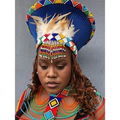 ZULU HAT is called ISICHOLO in traditional Zulu language and is traditionally worn during religious and cultural ceremonies. by the married Zulu woman of South Africa .  It is embellished with colourful beads, with feathers and is a true showstopper. The form of the isicholo, or married woman's hat, developed out of a 19th-century conical hairstyle that was worn as a sign of respect to one's husband and his family, in addition to serving as a public symbol of married status. In the early 20th century, a removable hat like this one replaced the hairstyle. This zulu accessory will make an amazing gift for a friend or partner. If you would like to standout. You have to try this on. Refund guarantee: It is guaranteed to satisfy or we will. give your money back Ceremonial Blue Adjustable Hat, Adjustable Blue Ceremonial Hats, Traditional Blue Cap, Traditional Blue Hat With Curved Brim, Traditional Blue Hat For Festival, Traditional Blue Festival Hats, Zulu Language, Zulu Hat, Basket Hat