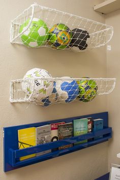 two shelves with soccer balls and books on them