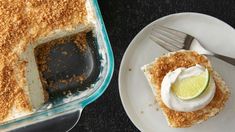 a piece of cake on a plate with a fork next to it