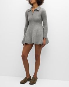 Loewe polo dress in cashmere knit    Spread collar; threebutton front    Long sleeves    Mini length    Aline silhouette    Slipover style    Cashmere/mohair    Made in Italy