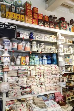 the shelves are filled with many different types of objects and items for sale on them