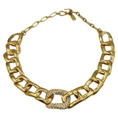 YVES SAINT LAURENT vintage gold tone curb chain necklace embellished with clear crystals. Hook clasp closure. Embossed YSL Made in France. Indicative measurements : max. length approx. 59 cm (23.23 inches) / max. width approx. 3.2 cm (1.26 inches). Materials : Gold tone metal hardware / Crystal. NOTES - This is a preloved vintage item, therefore it might have imperfections. - Colors may differ slightly from actual product appearance due to differences in lighting conditions. - As a buyer, you ar Crystal Notes, Saint Laurent Vintage, Slim Aarons, Curb Chain Necklace, Clear Crystals, Hook Clasp, Vintage Jewels, Jewel Tones, Curb Chain