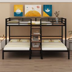 a bunk bed with three mattresses on it in a room that has wood flooring and beige walls