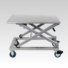 a metal table with wheels on it