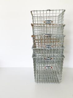 three metal baskets stacked on top of each other