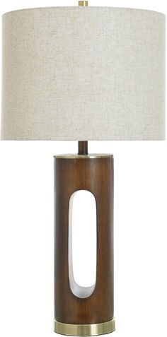 a wooden table lamp with a white shade on it and a beige fabric lampshade