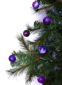 a christmas tree with purple and blue ornaments