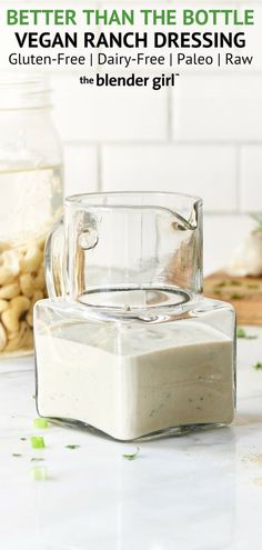 two blenders sitting on top of a white counter