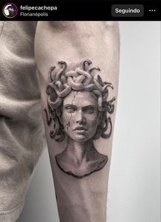 a man's arm with a tattoo on it and an image of medusa