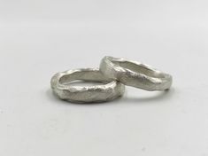 Organic silver band ring.  A thick irregular silver band that can be worn alone or two together also can be combined with others as a stacking ring. It is made of solid 925 silver with a rough finish. It is a simple ring suitable for your everyday casual outfit. It's so simple and yet so special and elegant! Αs each piece is individually handmade, slight variations in texture are possible. DESCRIPTIONS and MEASUREMENTS Material   : Sterling silver. Width 0,45 (cm) 0,18 (in") narrowest point up t Silver Ring For Men, Rustic Silver Untreated Rings, Rustic Untreated Silver Ring, Brutalist Sterling Silver Rings As Gift, Brutalist Oxidized Open Ring, Brutalist Hammered Silver Ring, Edgy Jewelry, Stackable Bands, Hammered Rings